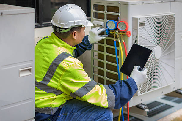 Professional Hvac technician working in The Rock, GA